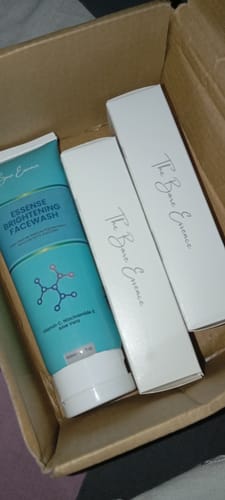 Customer's order showing the two Lip Cream boxes and the free facewash inside the delivery box.