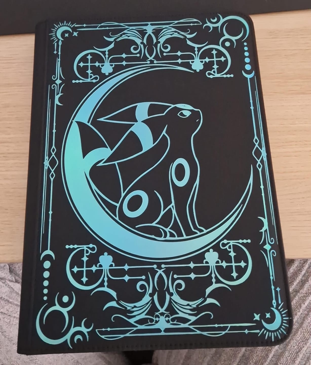 Customer photo review of Lunar Shadow Shiny 9-Pocket Trading Card Binder