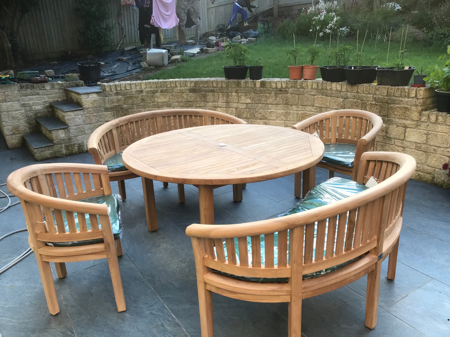 Customer photo review of Teak Garden Furniture 150cm Round teak garden table 2 San Francisco benches & 2 San Francisco chairs