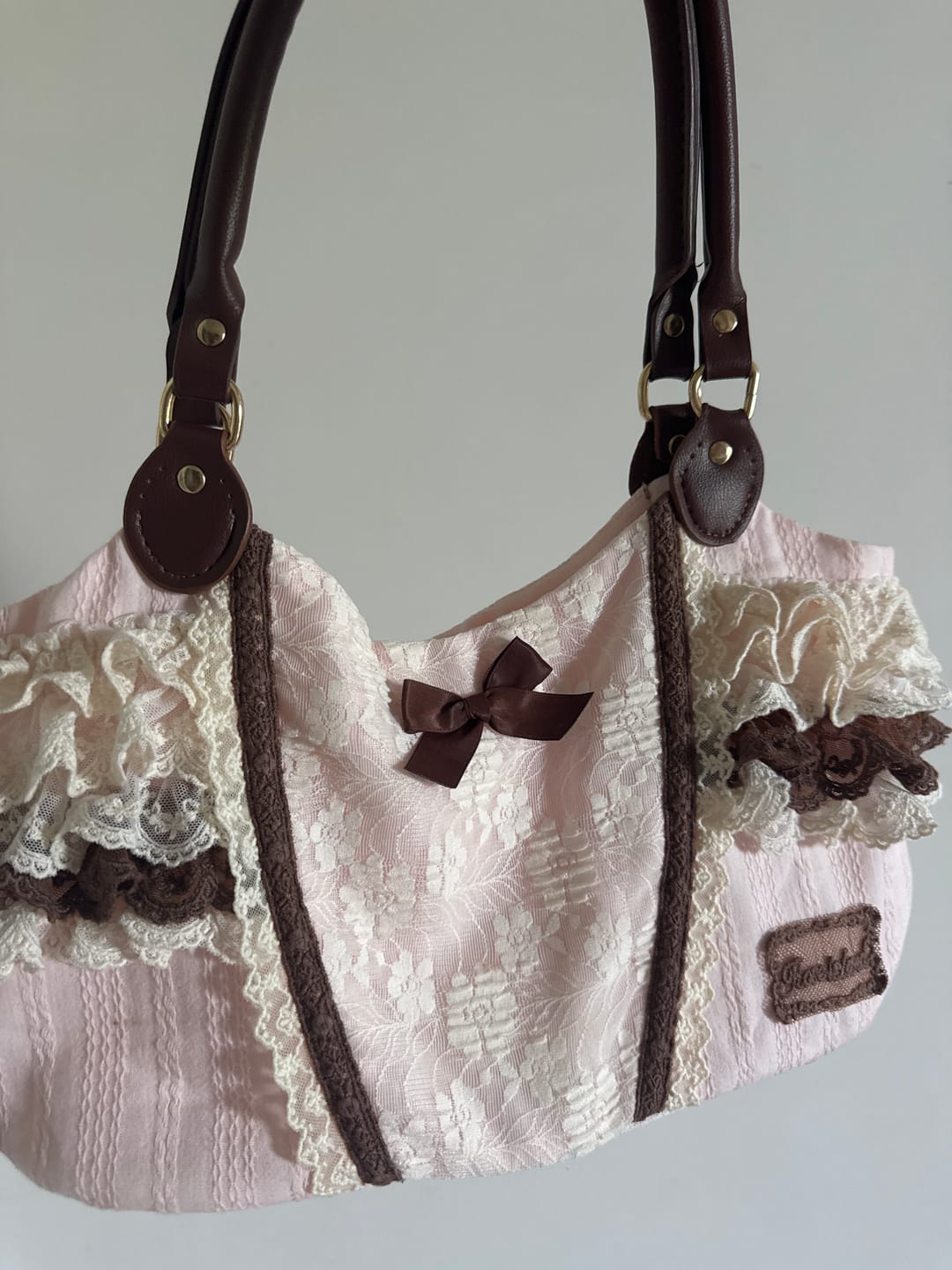 Customer photo review of Rose Island Forest Tea Party Neapolitan Shoulder Bag