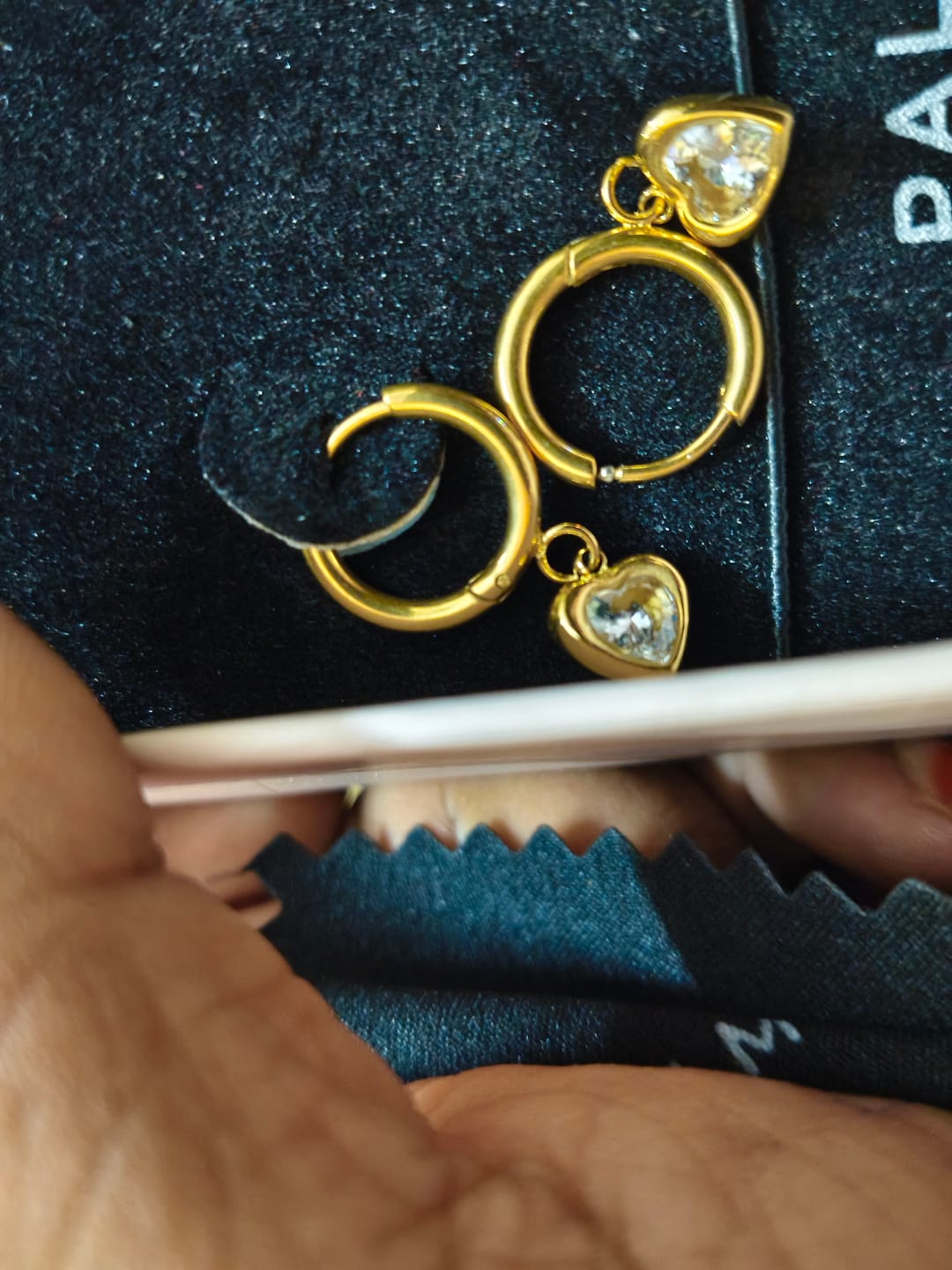 Customer photo review of Gemini Heart Hoops