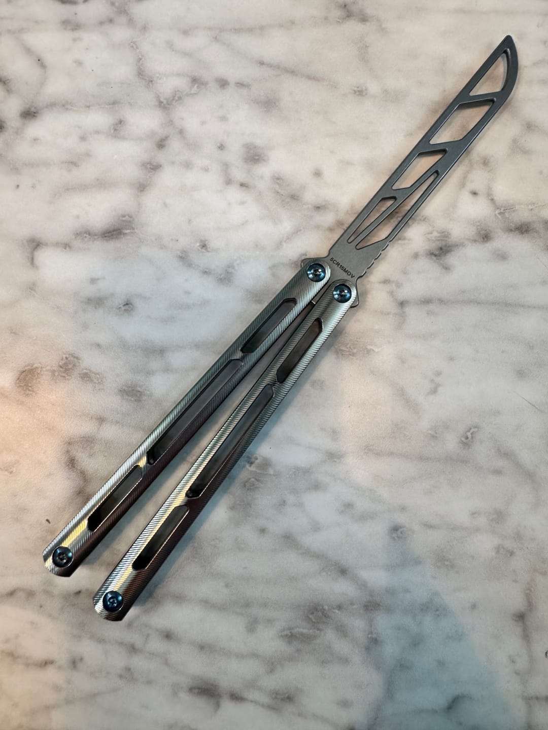Customer photo review of ARMED SHARK Tsunami Clone Titanium alloy handle stainless steel Trainer blade Bushing