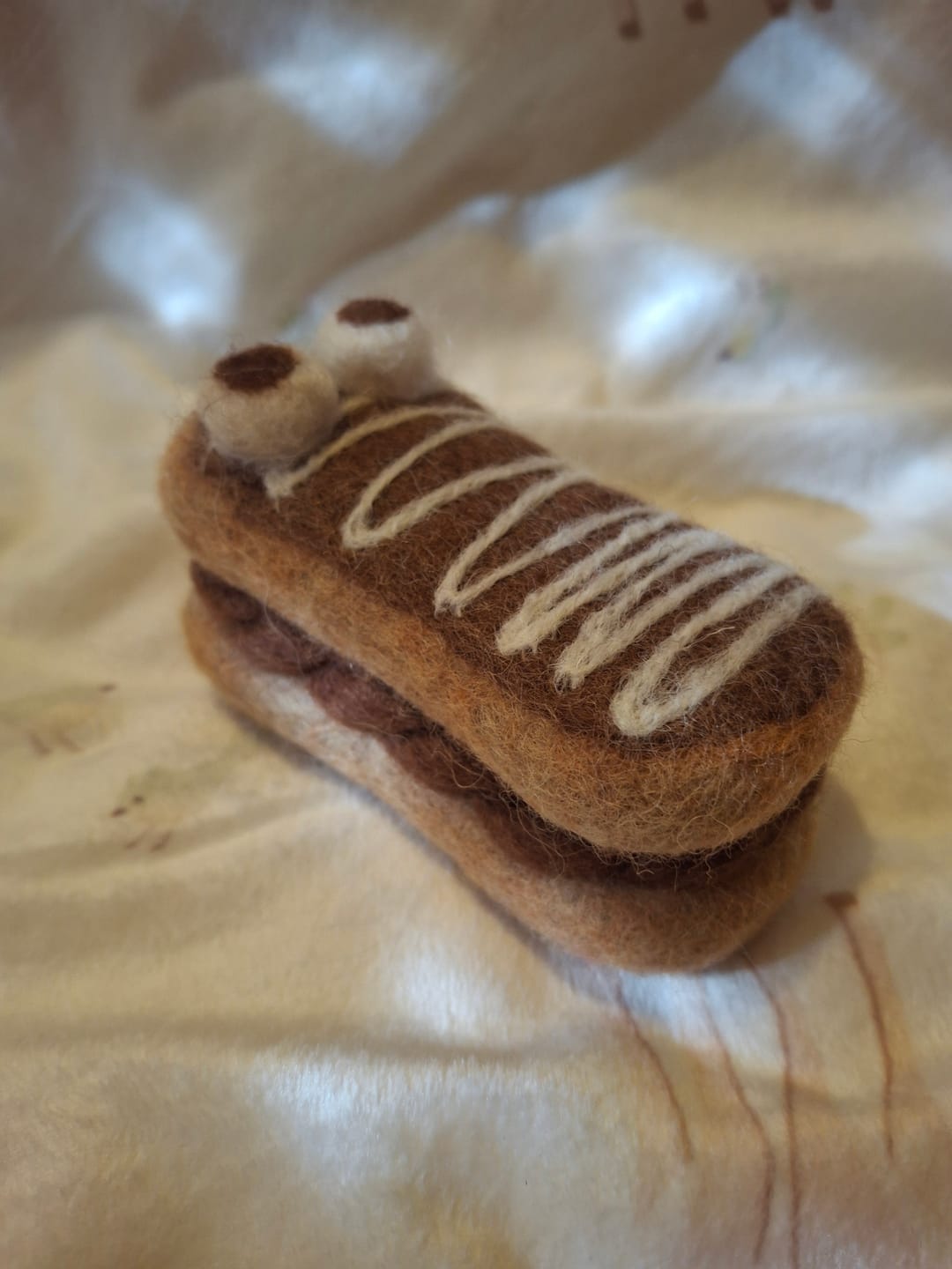 Customer photo review of Felt Mummy Chocolate Eclair for Halloween