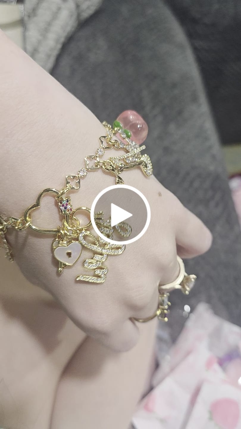 Customer video review of Design Your Own Custom Handmade Charm Bracelet or Anklet- 18 Karat Gold Plated-Stainless Steel- 3 to 20 Charms- 1 charms Included In Base Price Double Layer Option- Carabiner or Toggle Option