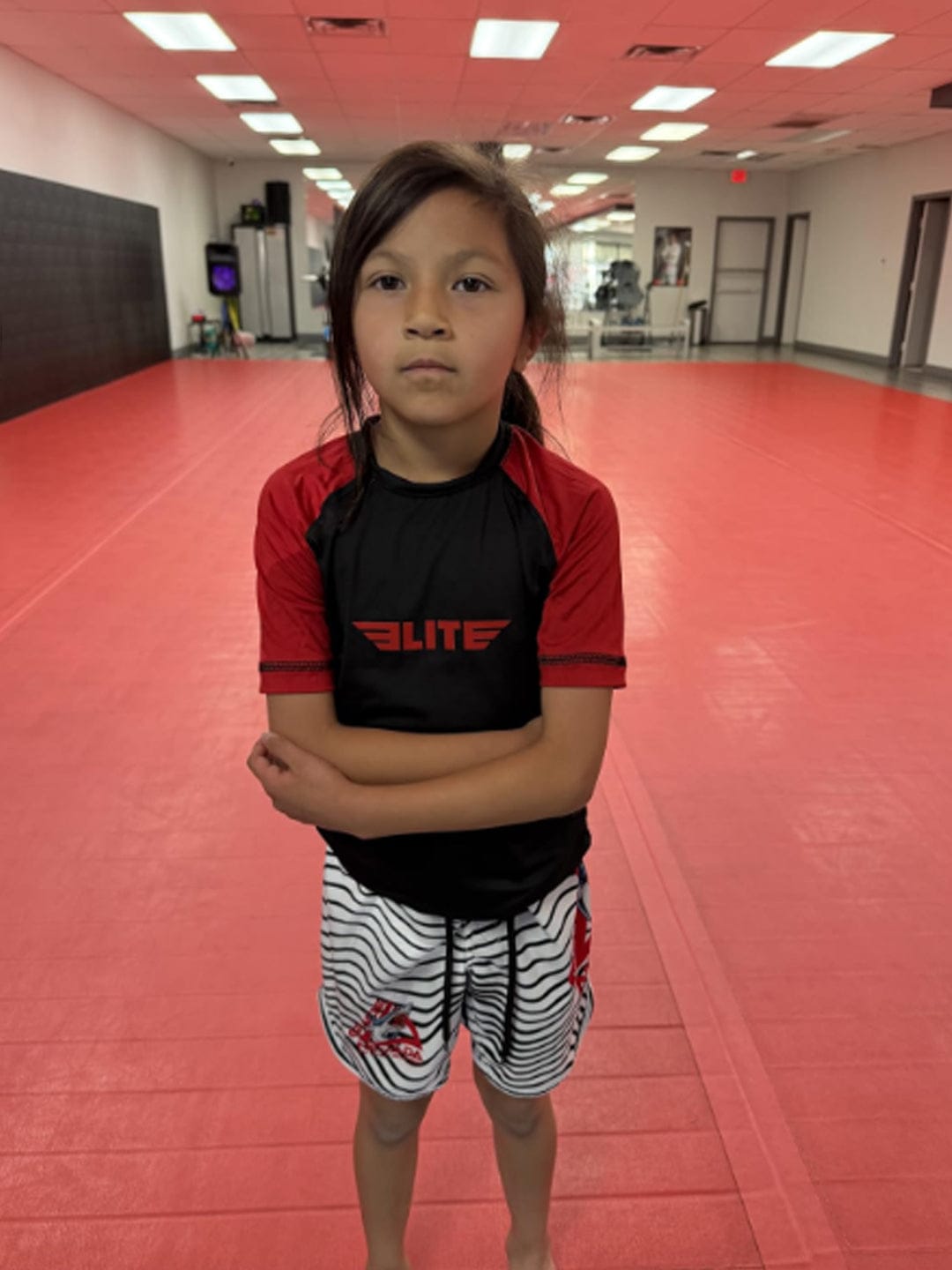Customer photo review of Standard Red Short Sleeve No-Gi Kids BJJ Rash Guard