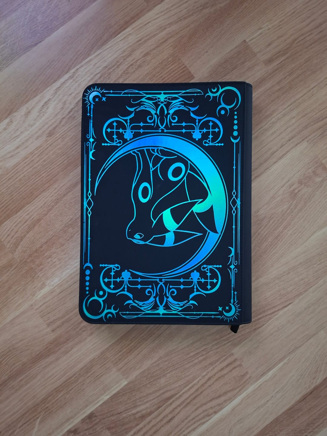 Customer photo review of Lunar Shadow Shiny 9-Pocket Trading Card Binder