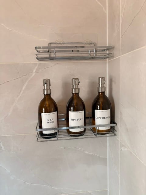 Customer photo review of Set of 3 Bathroom Reusable Amber Glass Bottles 500 ML with Metal Pump