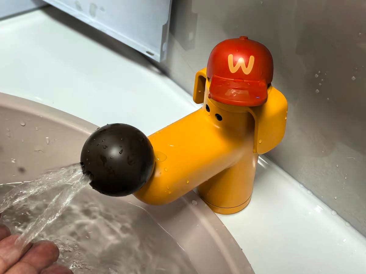 Customer photo review of Creative Dog Bathroom Faucet with Hot and Cold Mixer