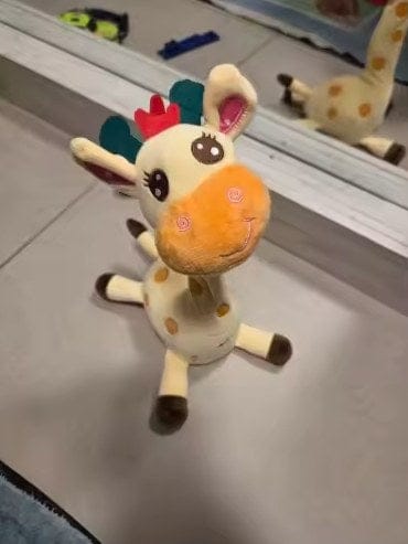 Customer photo review of Singende Tanzende Giraffe Plüschtier | Musikspielzeug Sprachfunktion 60 Kinderlieder Kleinkind