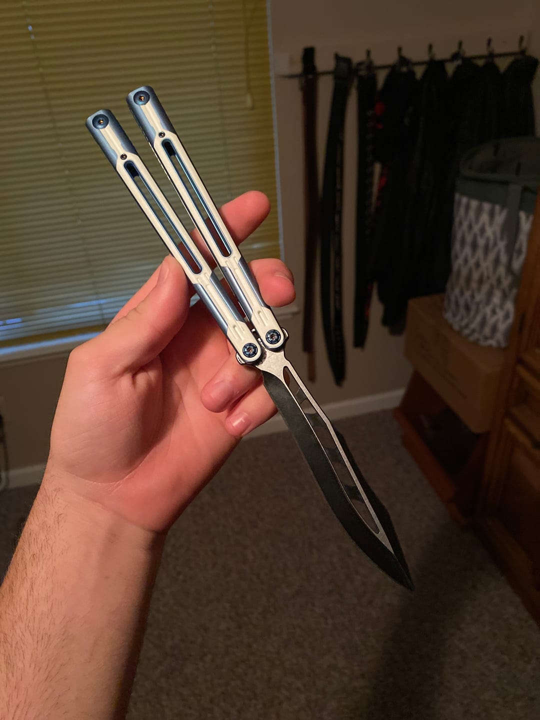 Customer photo review of RAD Cygnus V2 Genuine Balisong Titanium-6AL-4V Handle CPM-S35VN Stainless Steel Live Blade Bushing