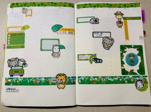 Customer's open planner decorated with cute safari-themed stickers from the Sticker Subscription box.