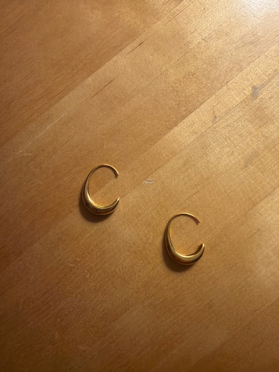 Customer photo review of Classic Drop Hoop Earrings