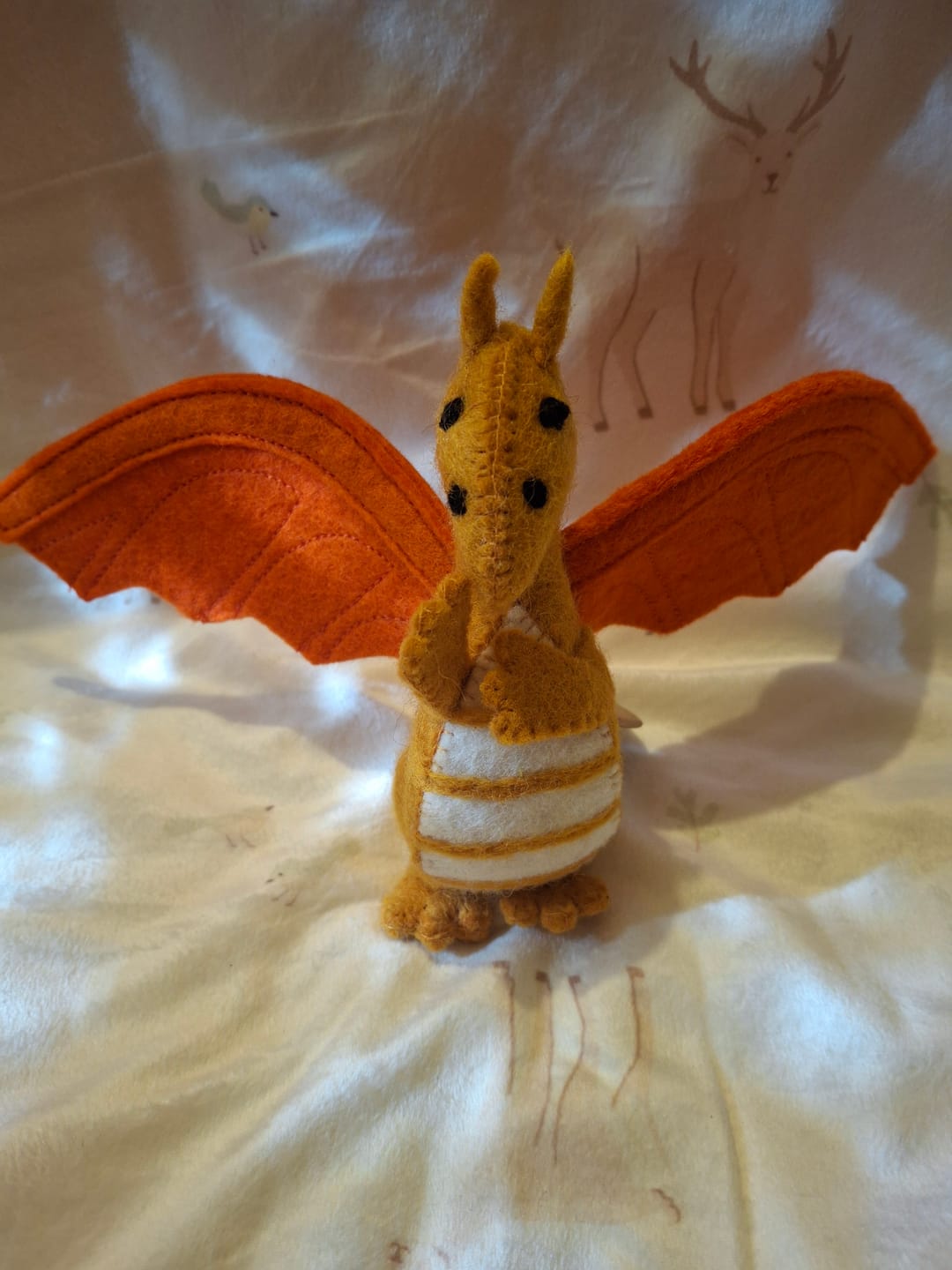Customer photo review of Felt Dragon Toy - Orange