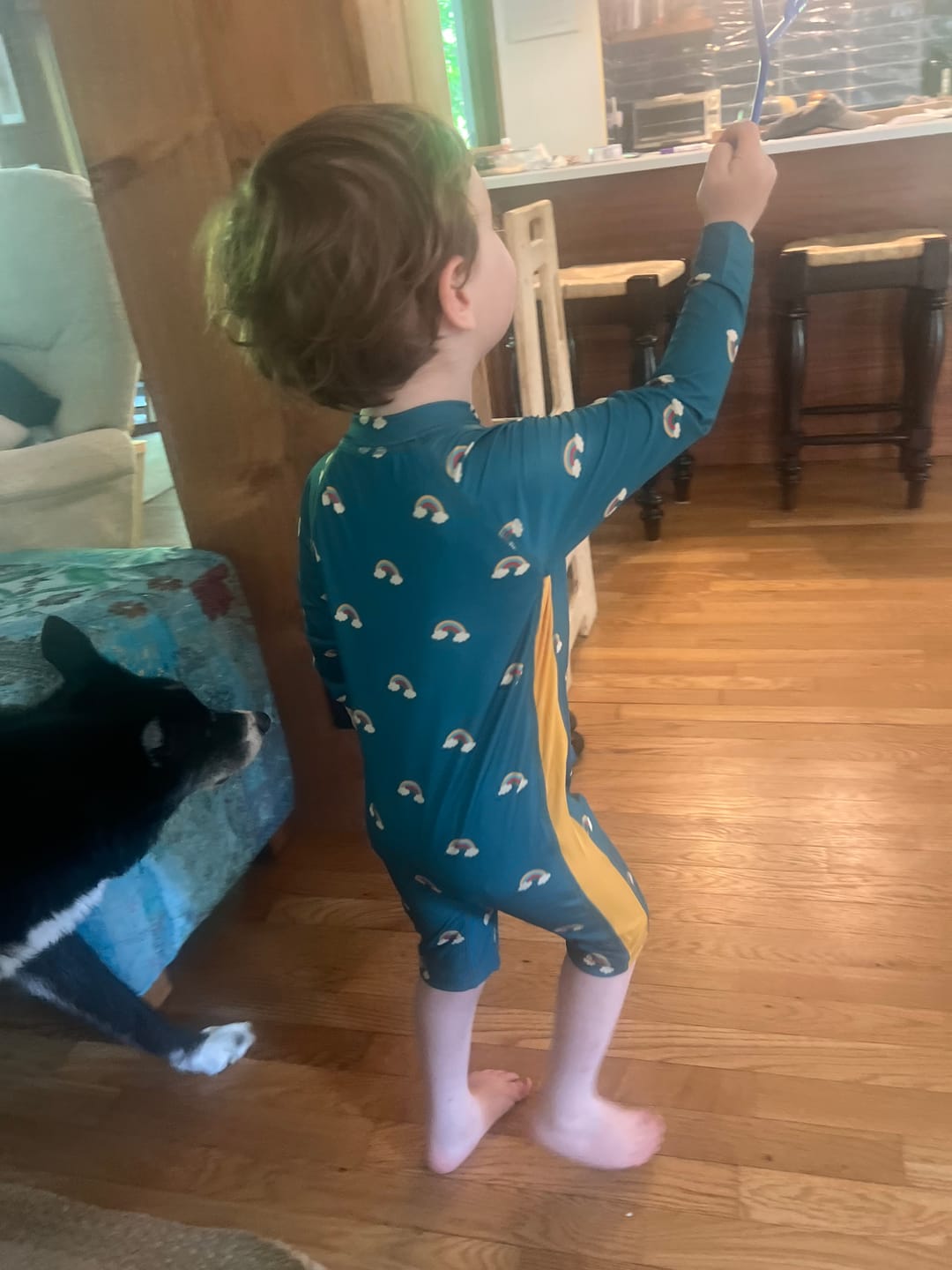Customer photo review of Teal Rainbows UPF 50 Recycled Sunsafe Sunsuit