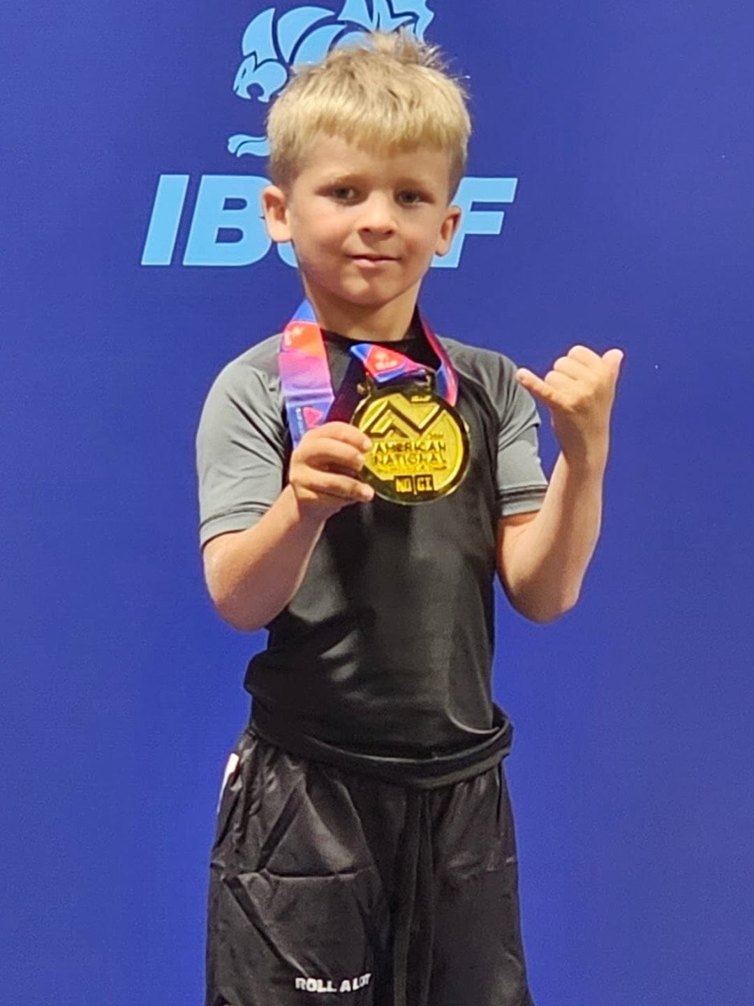 Customer photo review of Standard Gray Short Sleeve No-Gi Kids BJJ Rash Guard