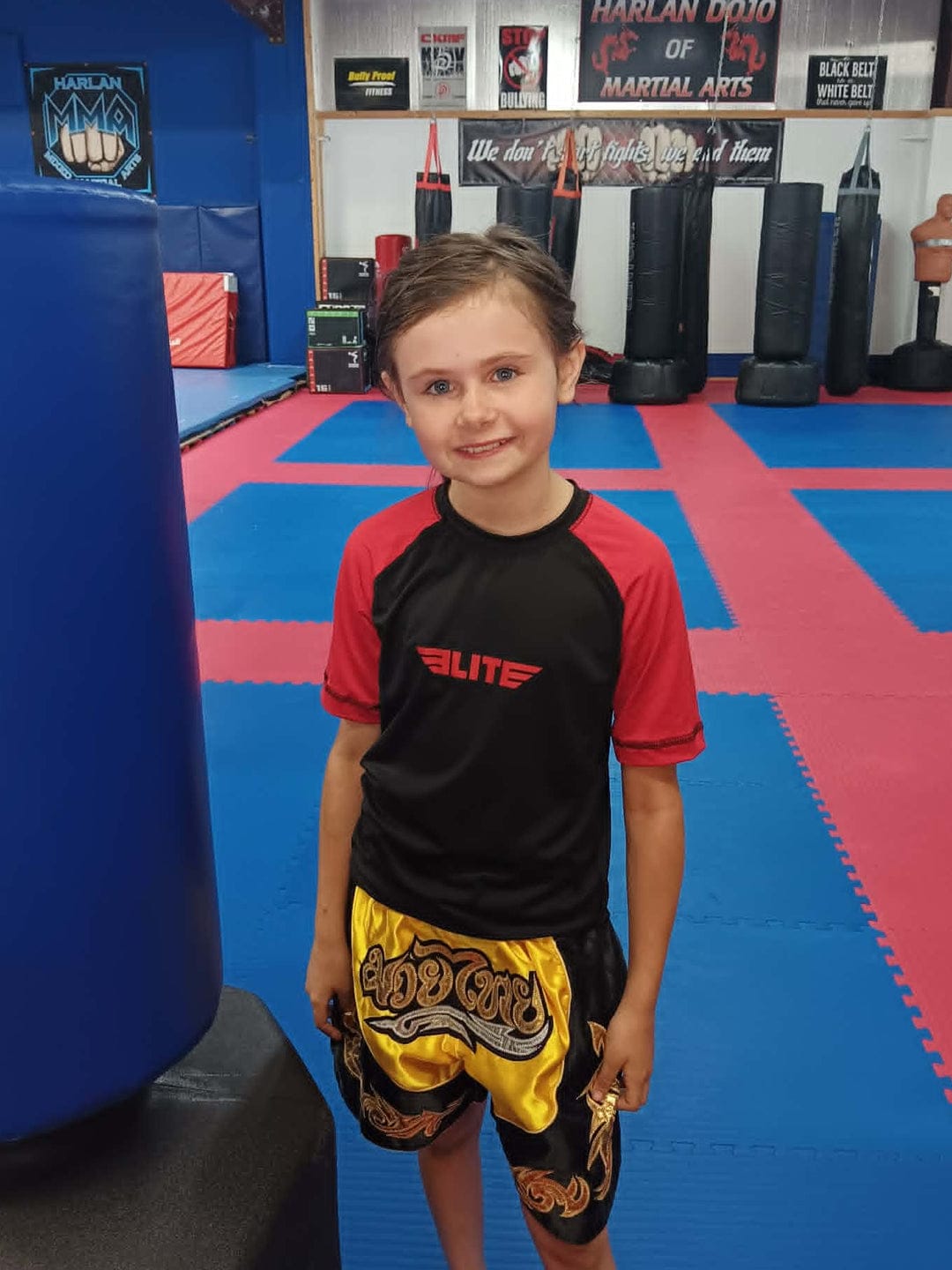 Customer photo review of Standard Red Short Sleeve No-Gi Kids BJJ Rash Guard
