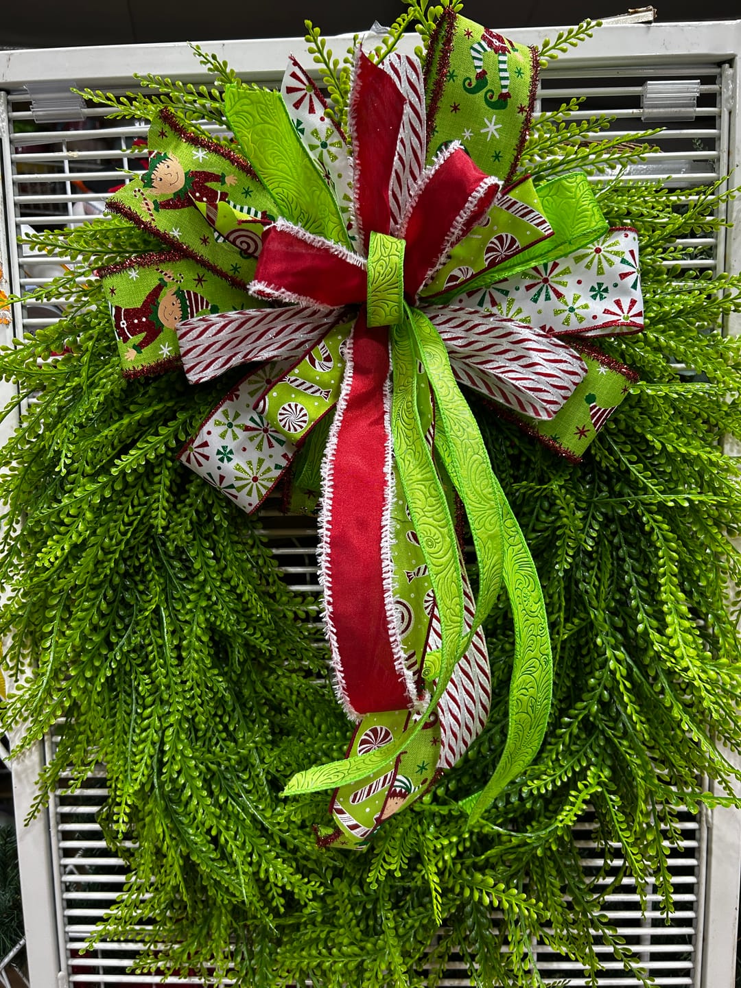 Customer photo review of 26"L X 17"W Draped Button Fern Wreath Tt Green FG688535