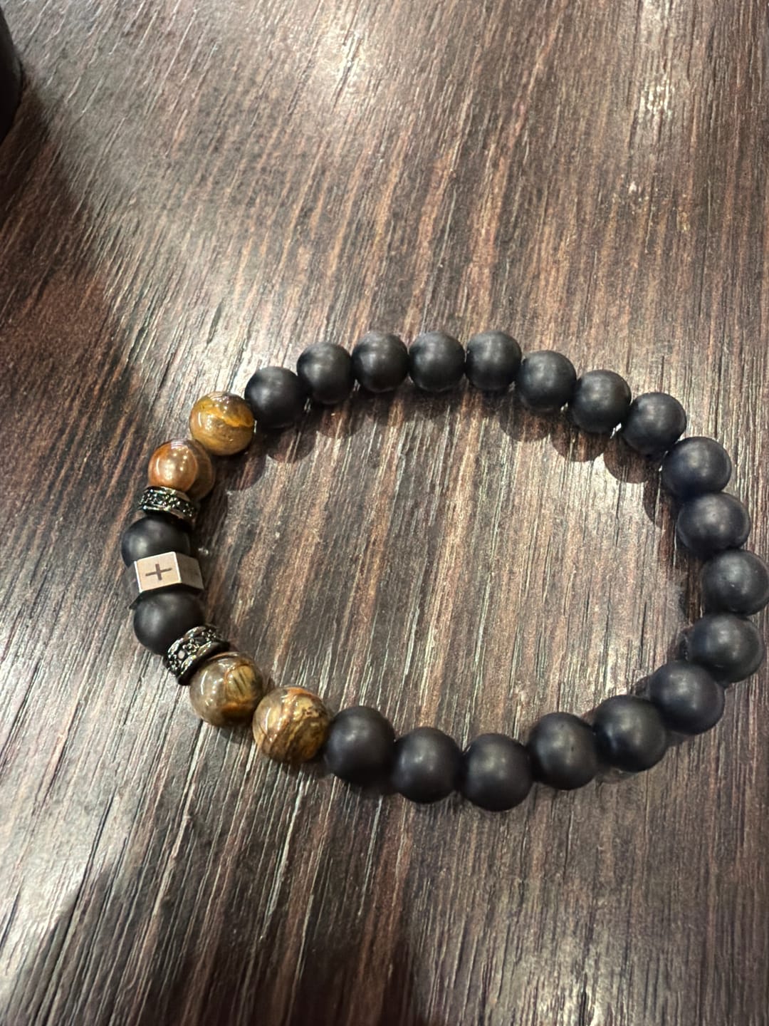 Customer photo review of Christianartworkshop Cross Bracelet with Tiger's Eye, Black Onyx & CZ - Accented Stainless Steel
