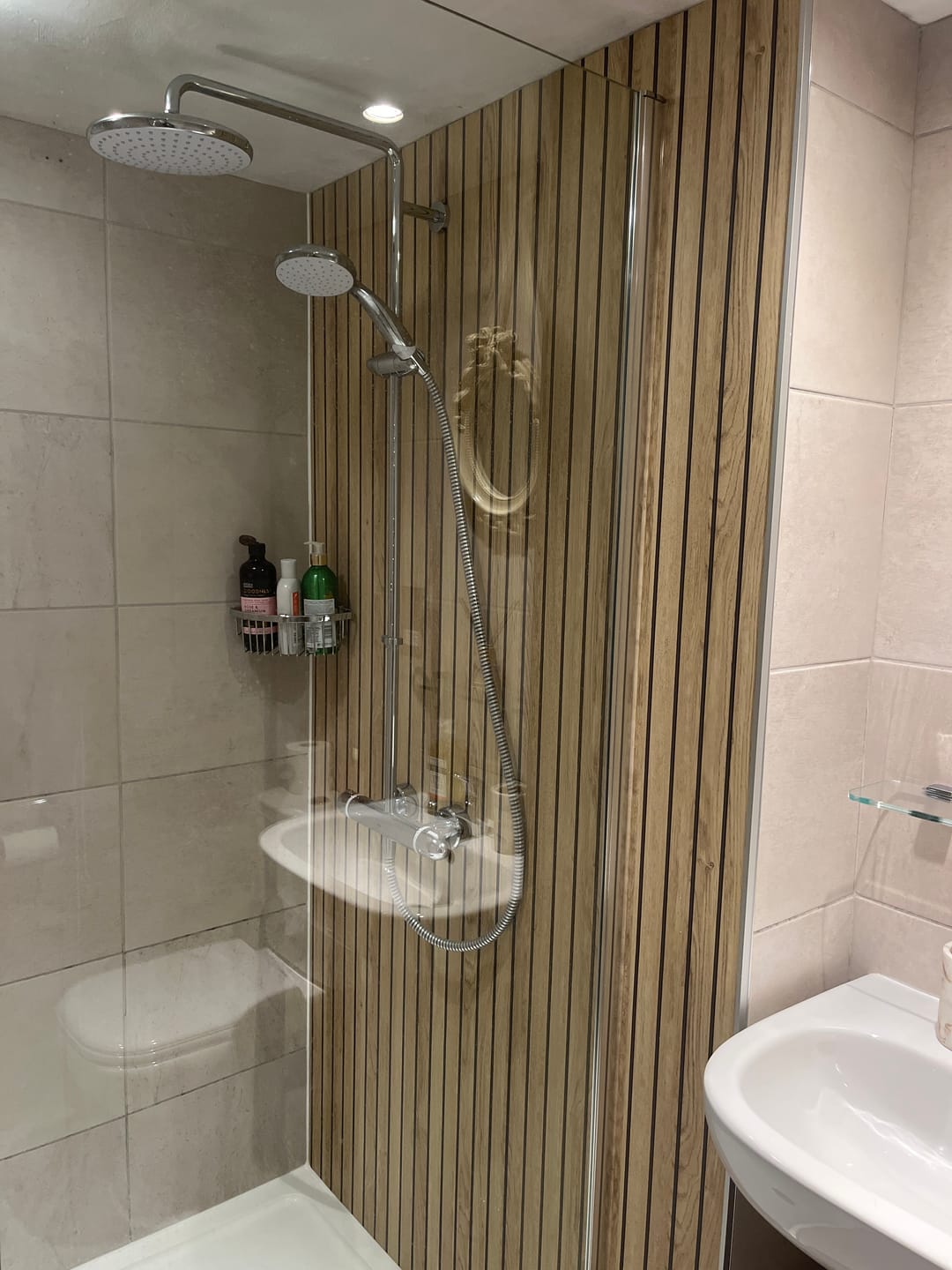Customer photo review of Sivara Oak Slatted Wood Effect PVC Waterproof Shower Panel