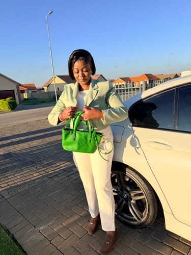 Customer photo review of Silver Era Signature Bag Charm