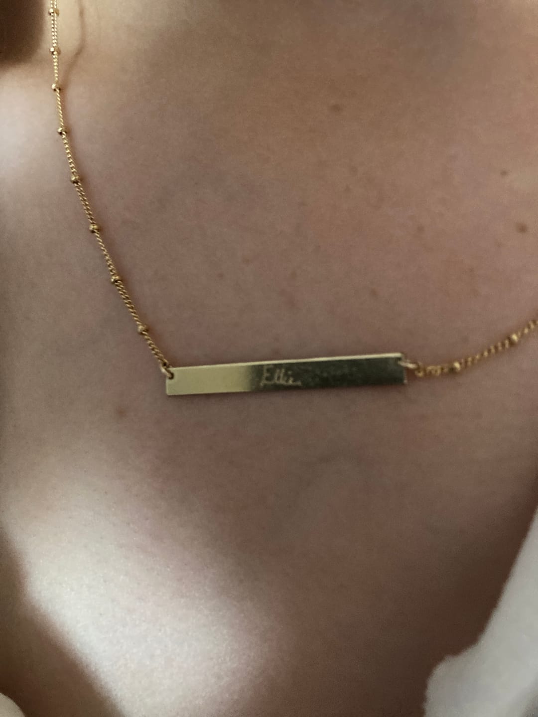 Customer photo review of Kira Handwriting Small Bar Necklace