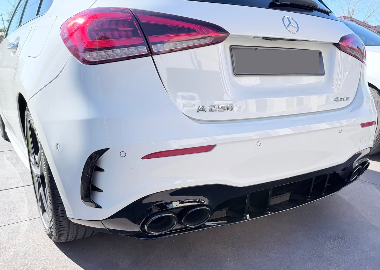 Customer photo review of W177 Hatchback A Class Sport Rear Bumper Vent Insert Canards in Gloss Black