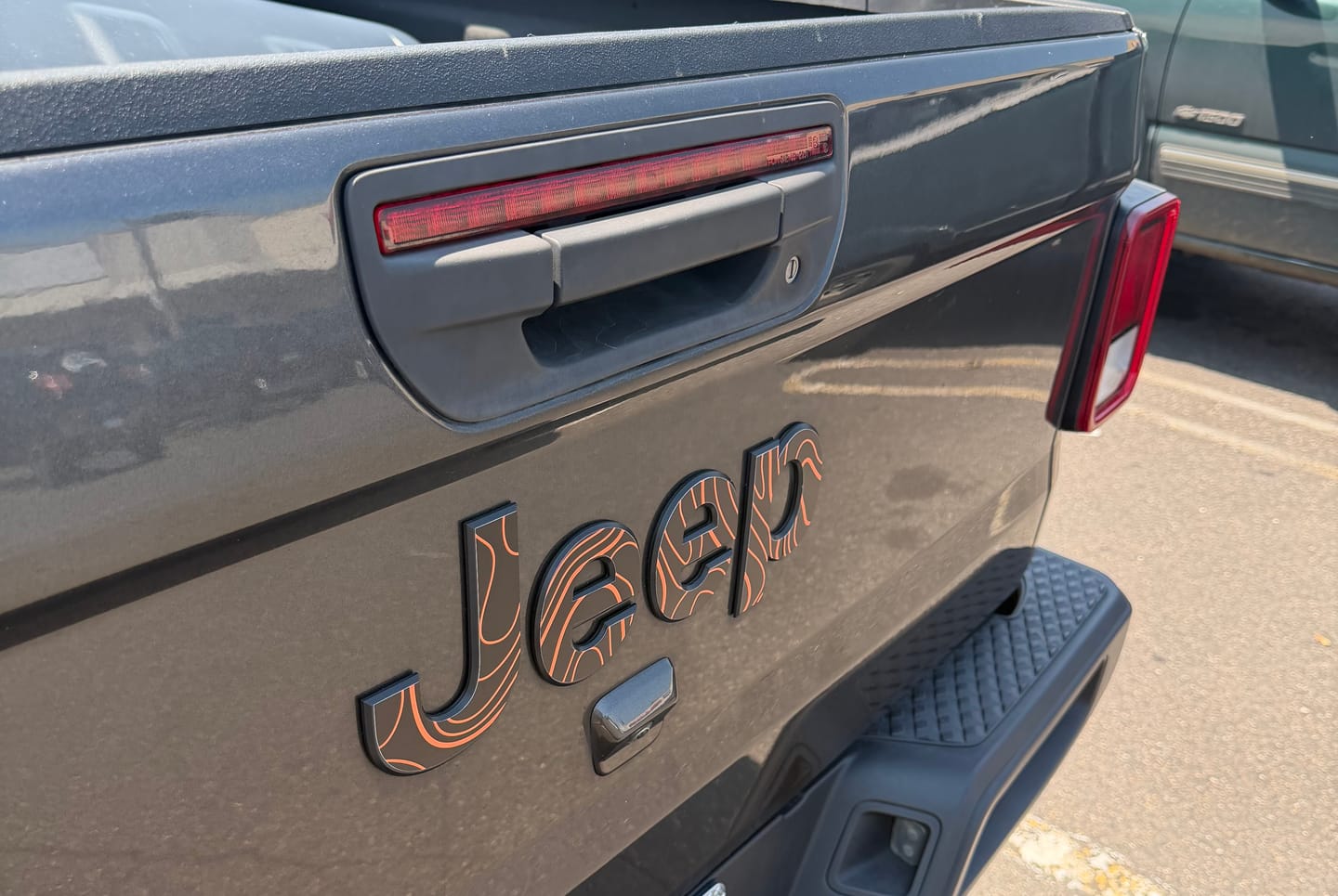 Customer photo review of JEEP Steering Wheel Emblem Overlay Decal — 30+ Colors & Designs (Flag, Topo, Animal, Solid)