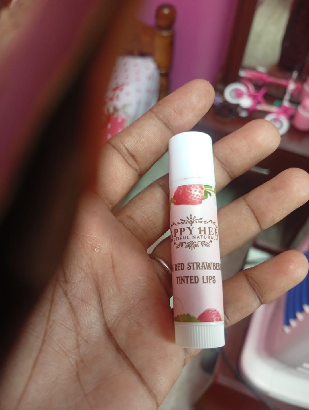 Customer photo review of Lip Balm With Tint Strawberry