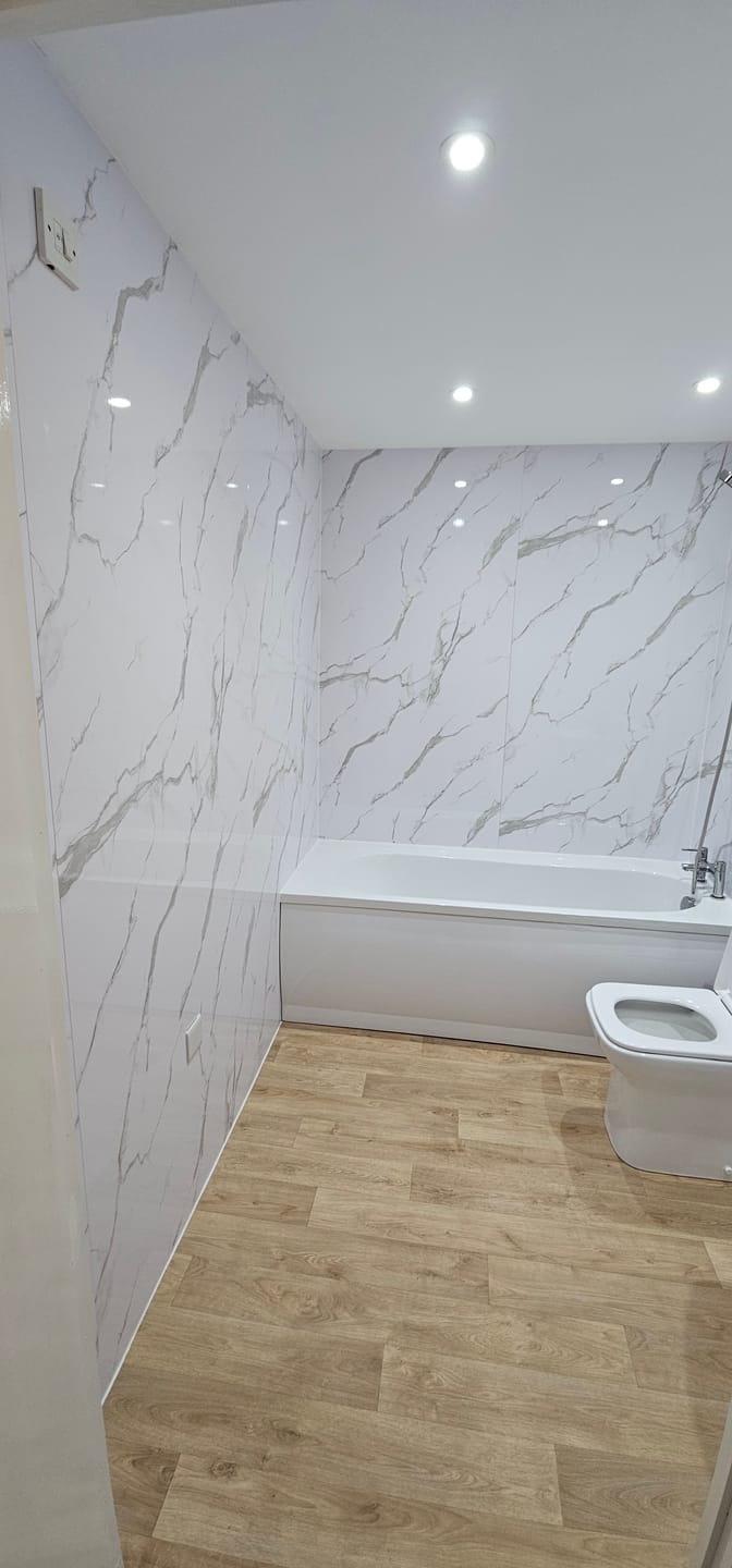 Customer photo review of Premium Carrara White Marble Gloss Shower Wall Panel - 1M x 2.4M