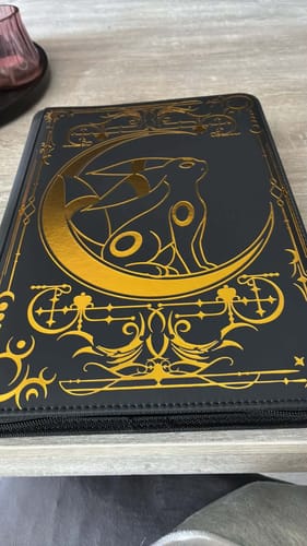 Customer photo review of Lunar Shadow 9-Pocket Trading Card Binder