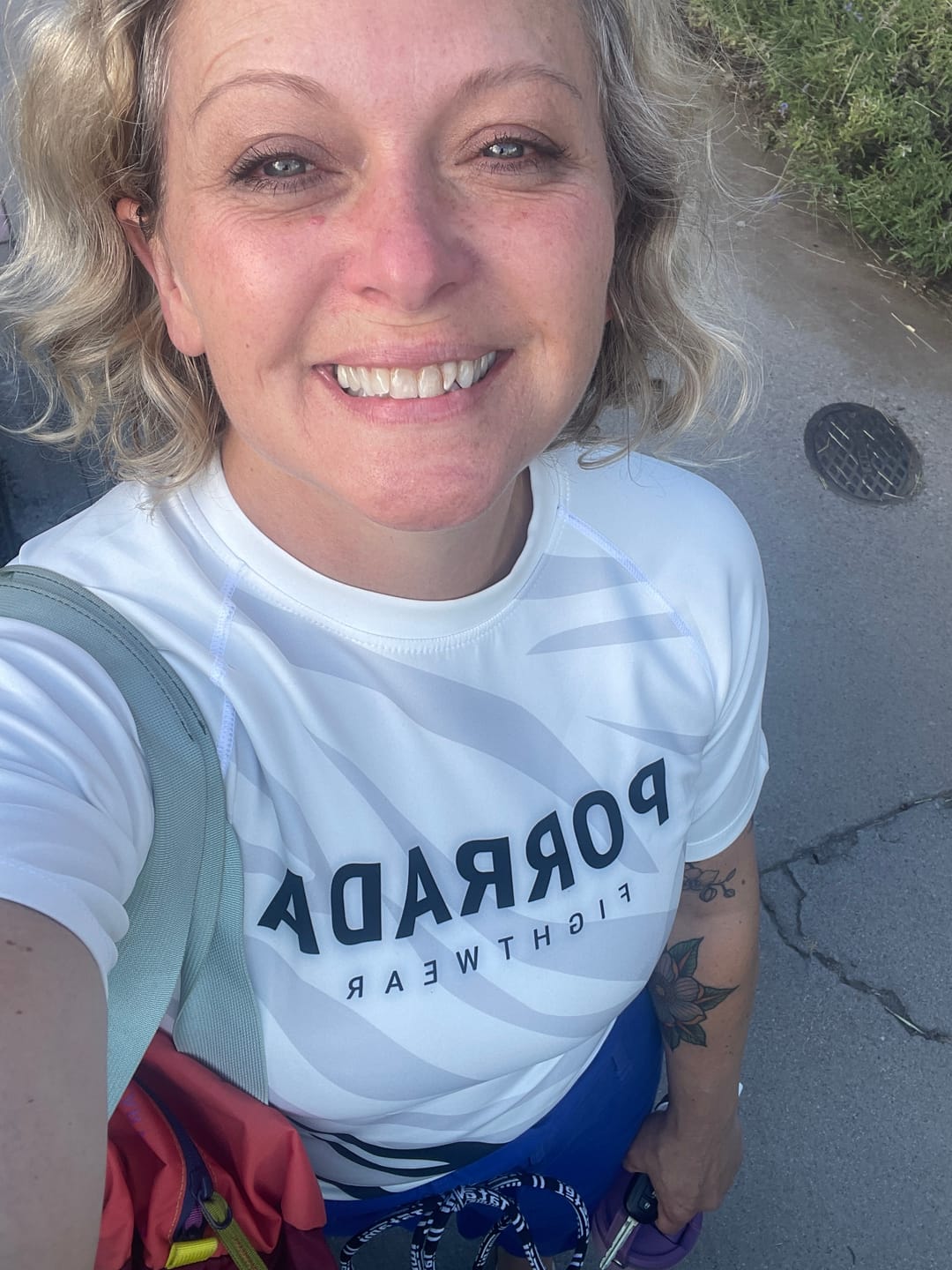 Customer photo review of WHITE BELT COMPETITION RANKED WOMEN SHORT SLEEVE RASH GUARD