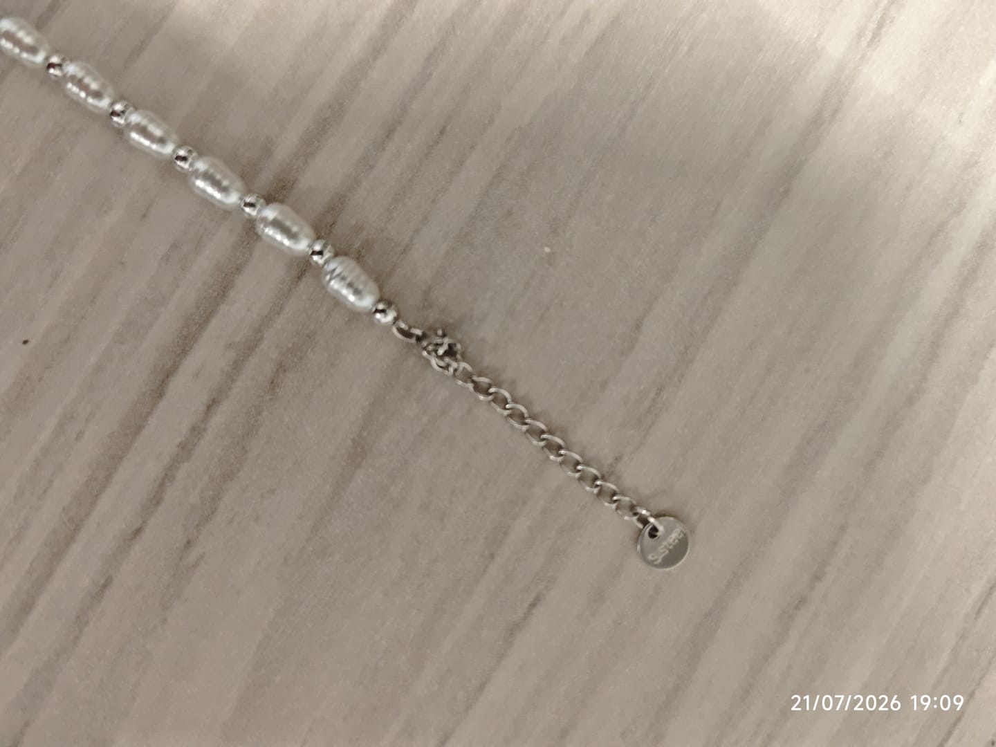 Customer photo review of Girocollo Family In Perle con ciondoli Bimbo Personalizzati