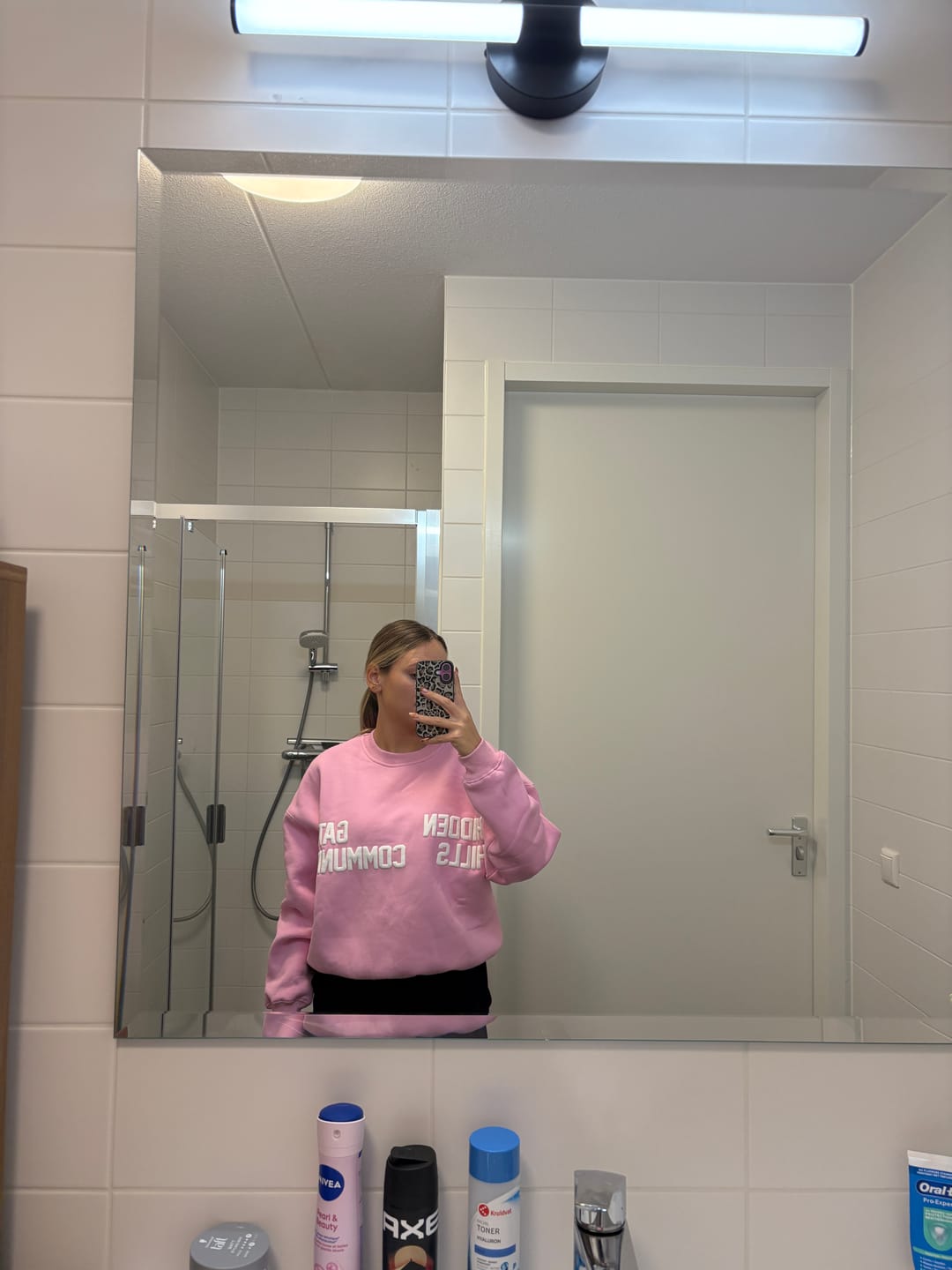 Customer photo review of the GATED COMMUNITY SWEATER in BUBBLEGUM PINK