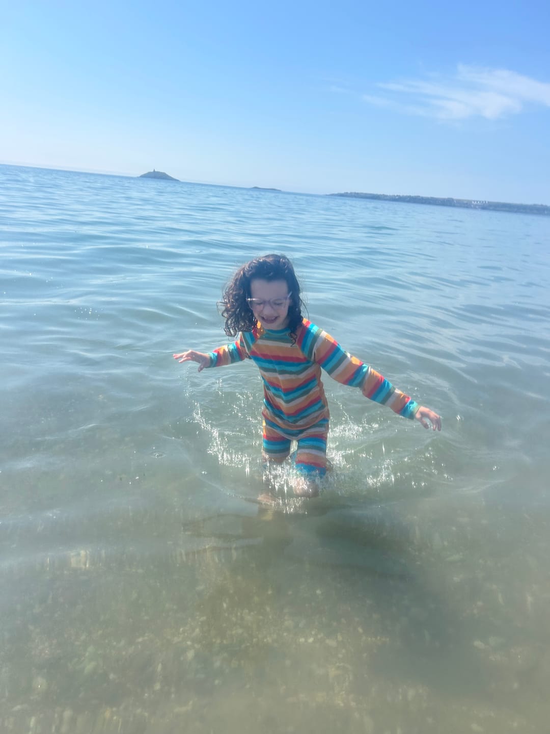 Customer photo review of Rainbow UPF 50+ Recycled Sunsafe Sunsuit
