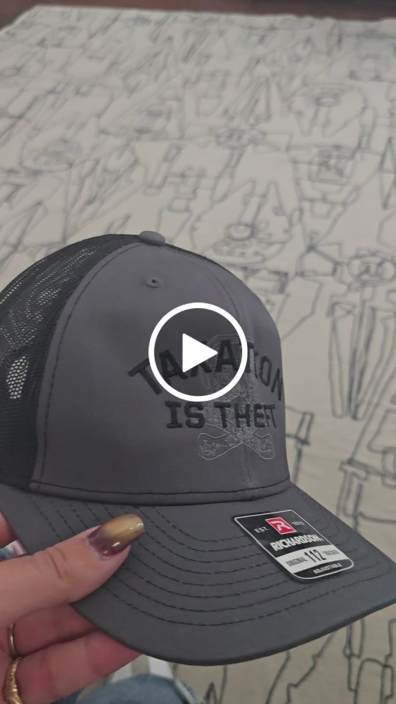 Customer video review of Taxation is Theft Trucker Hat