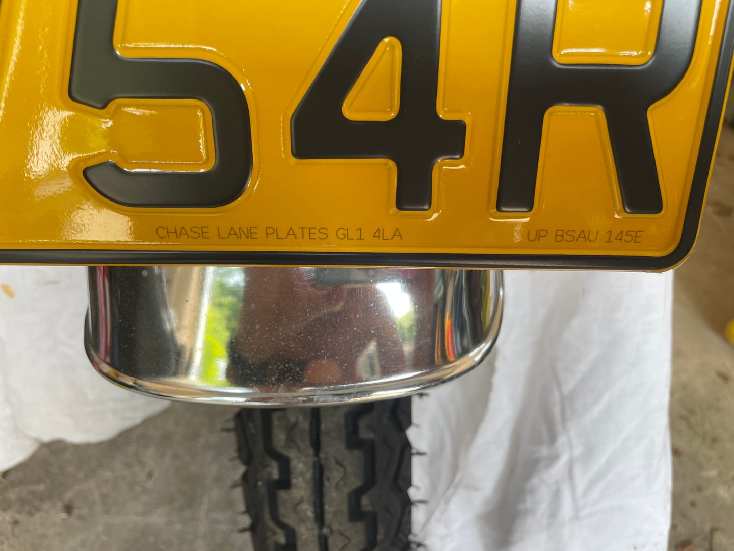 Customer photo review of Metal Pressed Motorcycle Number Plate – 9 x 7 Inches