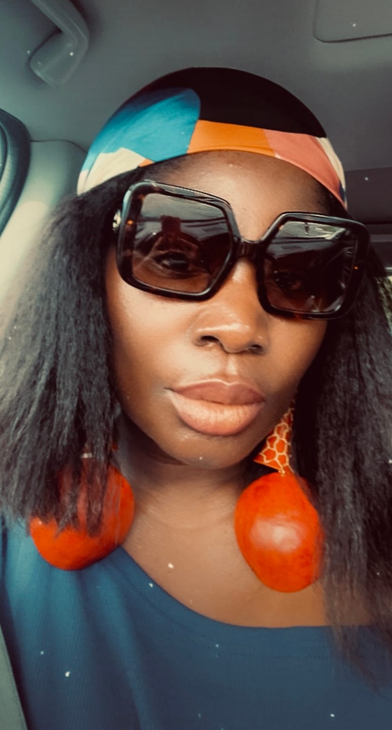 Customer photo review of Giraffe Neck Statement Earrings