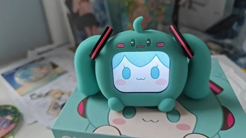 Customer photo review of Officially Licensed Hatsune Miku Wireless Earphones with Smart Display Desktop Stand