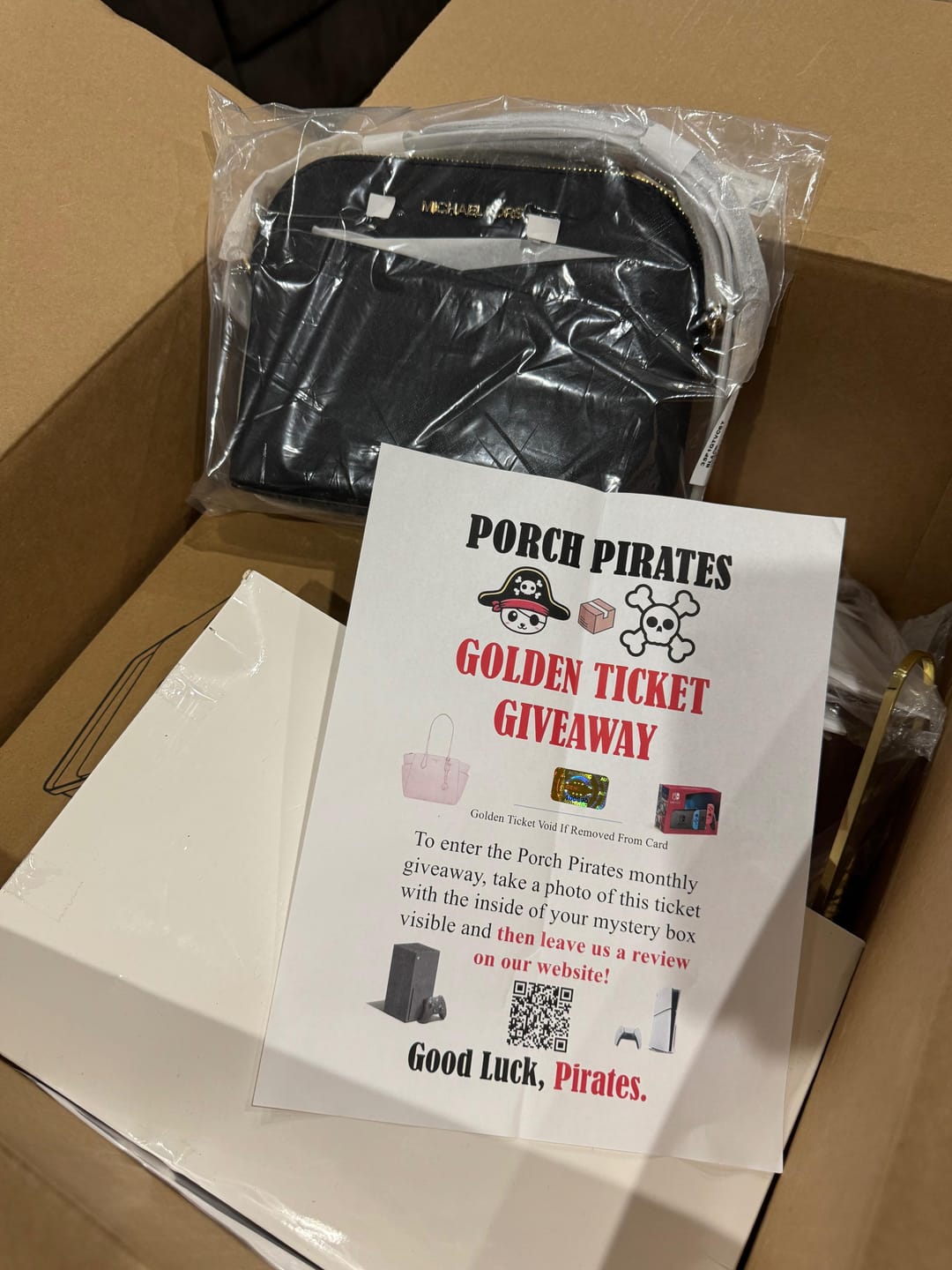 Customer photo review of The Classic Liquidation Mystery Box - Blue Tape PS5 Chance Box