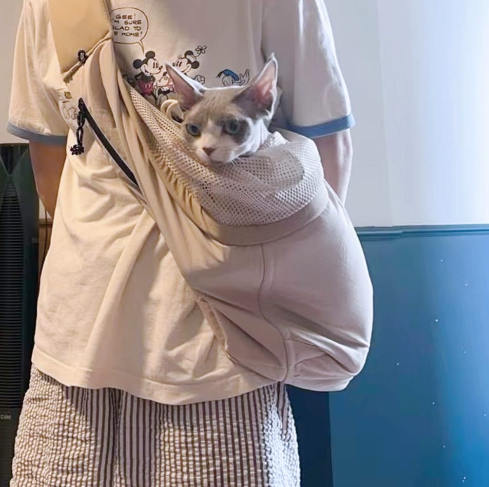 Customer photo review of Ergonomic Portable Hands-Free Pet Sling Carrier