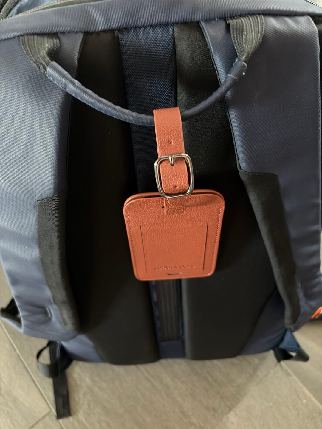 Customer photo review of Trackable Luggage Tag