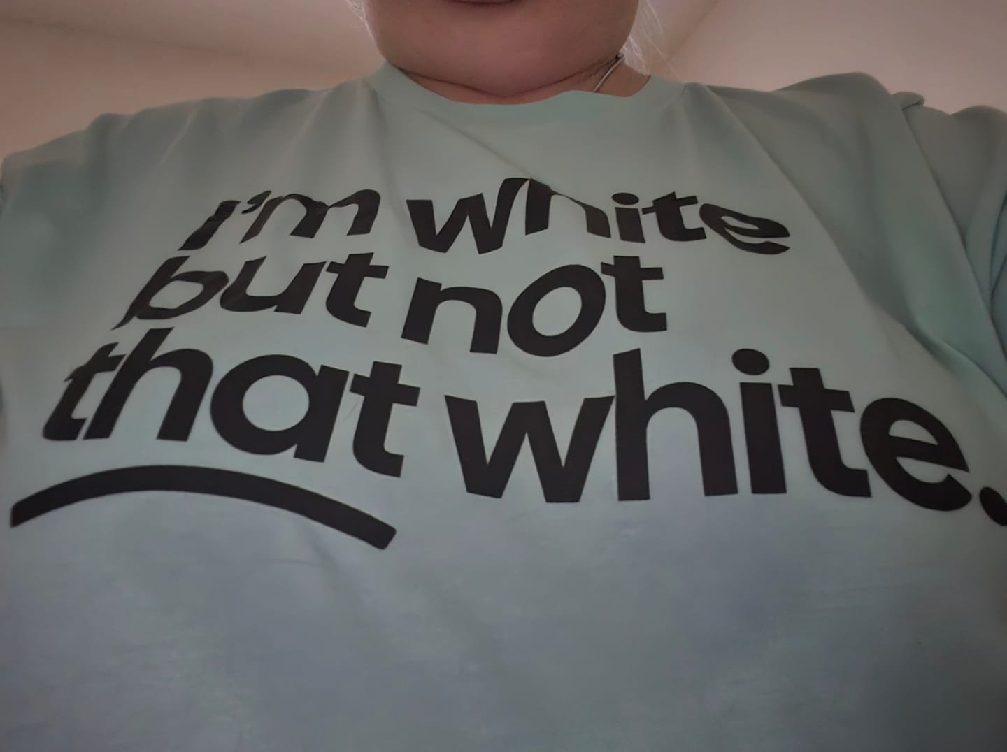 Customer photo review of I’m white but not that white Unisex Tee