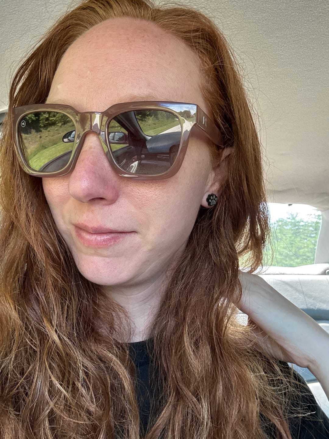 Customer photo review of Paw Print Studs Hypoallergenic Earrings for Sensitive Ears with Plastic Posts