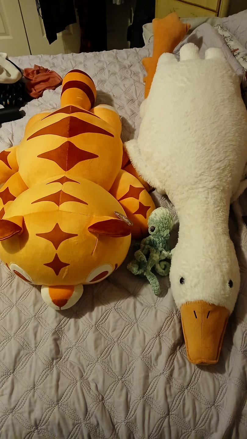 Customer photo review of GIANT 4LB Weighted Multi-Tiger Plush