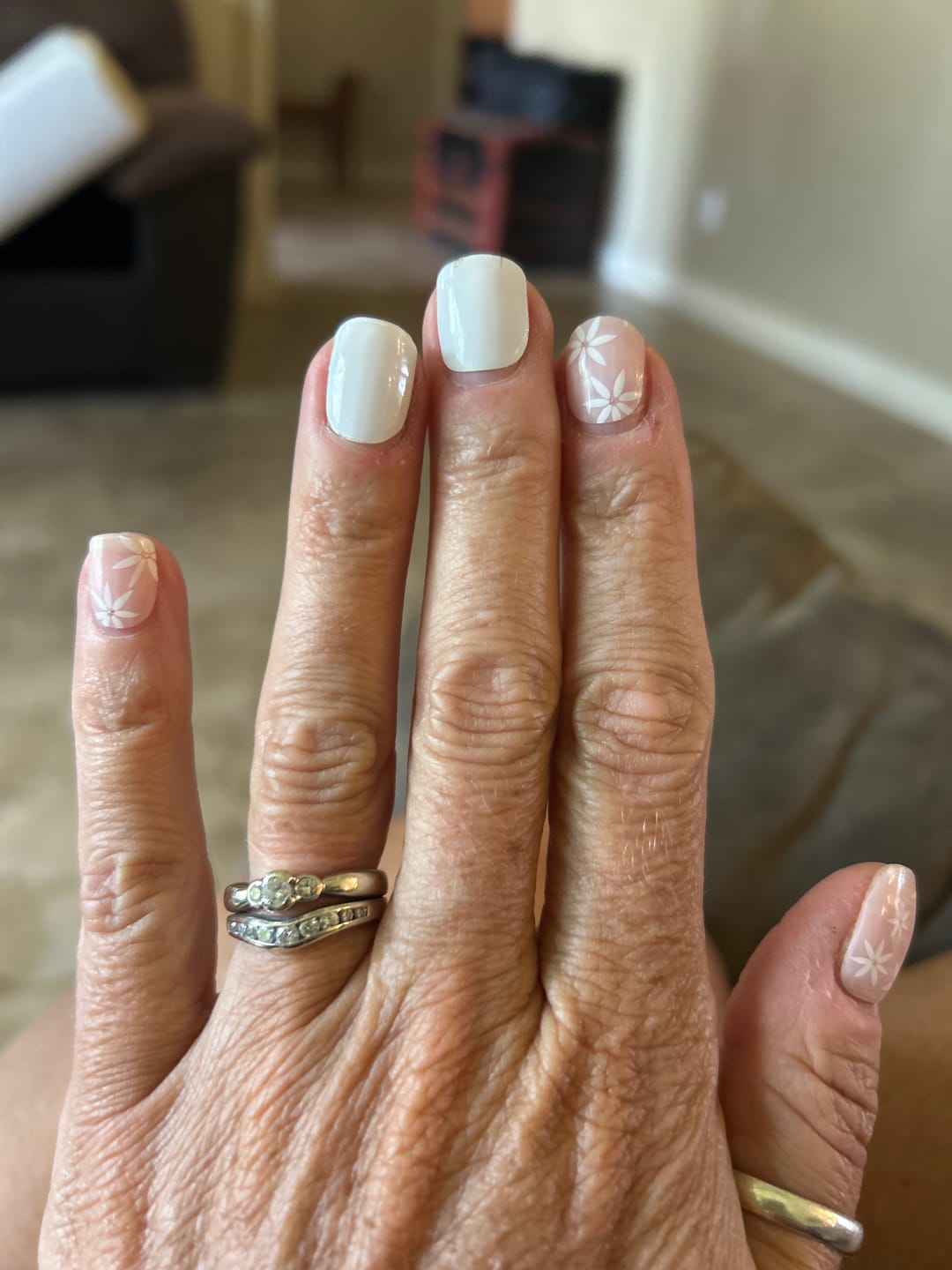 Customer photo review of Pretty Pink Daisies DIY Semicured Gel Nail Sticker Kit