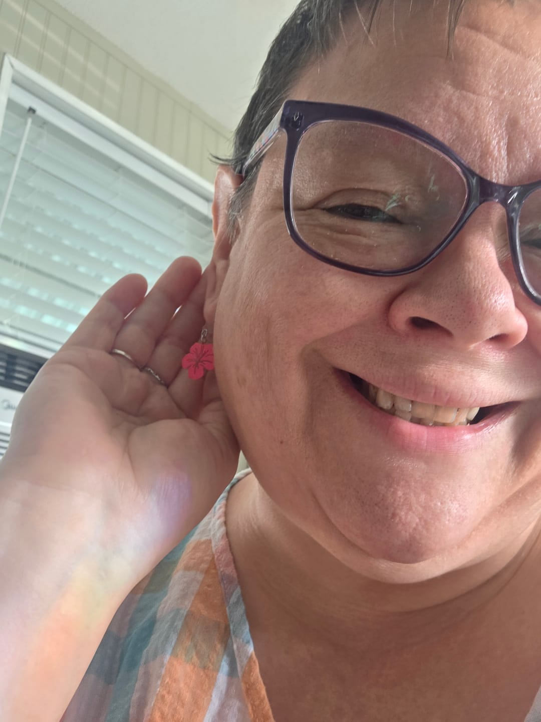 Customer photo review of Hibiscus Dangles Hypoallergenic Earrings for Sensitive Ears with Plastic Posts