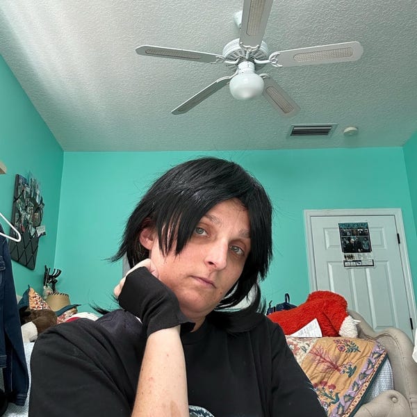 Customer photo review of Men Black Long Straight Fringe Bangs Layered Mullet Cosplay Wig