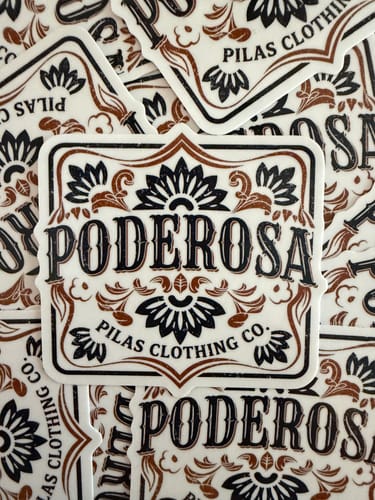 Customer's pile of custom vinyl stickers with a detailed black and brown 'PODEROSA' design.