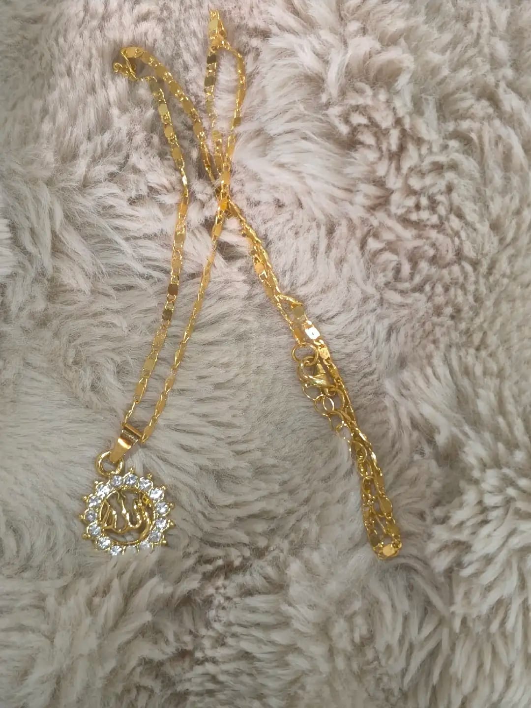 Customer photo review of HilalHaven Allah Sacred Arabic Calligraphy Sunburst Pendant Necklace