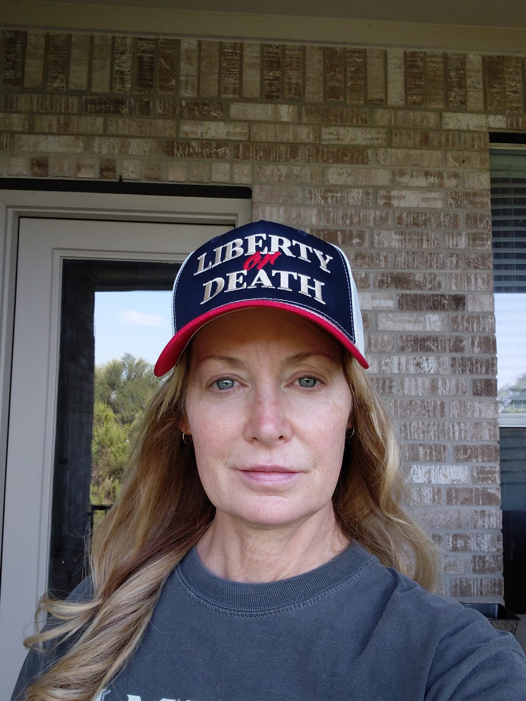 Customer photo review of Liberty or Death Embroidered Trucker Hat